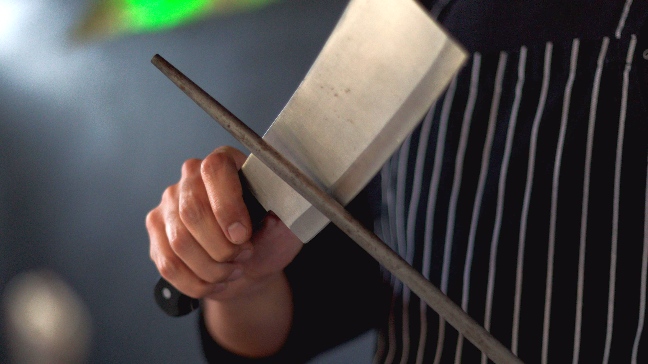 Knife being sharpened
