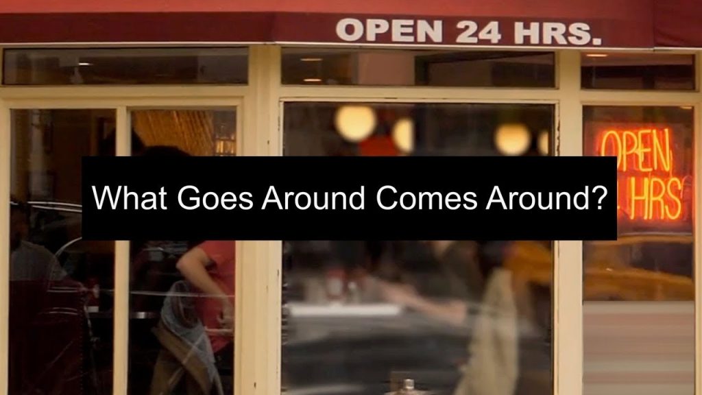 Title card for What Goes Around Comes Around showing the front of a shop with a sign saying Open 24 Hours