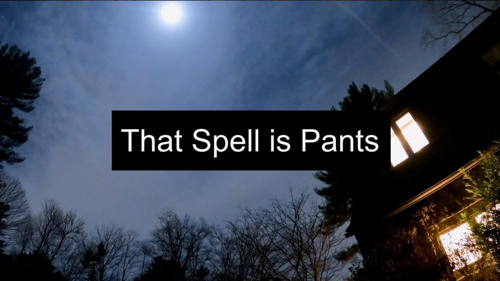 Title card for That Spell is Pants showing a night-time sky with a bright moon above a house with lit-up windows